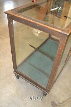 Antique Oak/Glass Country Store Display Upright Display Showcase Cast Iron Legs