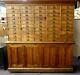 Antique Store Display Cabinet. 50 Drawers. 4 Shelves. 2 Work Boards. 79.5hx78w