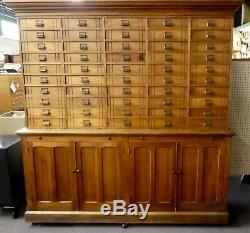 Antique Store Display Cabinet. 50 drawers. 4 Shelves. 2 Work Boards. 79.5Hx78W