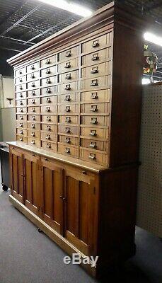 Antique Store Display Cabinet. 50 drawers. 4 Shelves. 2 Work Boards. 79.5Hx78W