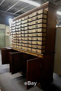 Antique Store Display Cabinet. 50 drawers. 4 Shelves. 2 Work Boards. 79.5Hx78W