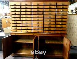 Antique Store Display Cabinet. 50 drawers. 4 Shelves. 2 Work Boards. 79.5Hx78W