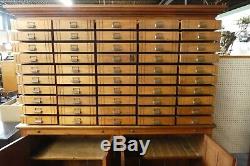 Antique Store Display Cabinet. 50 drawers. 4 Shelves. 2 Work Boards. 79.5Hx78W
