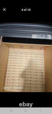 Large eyeglass display case with lights. 51 wide x 16 deep x 90 tall