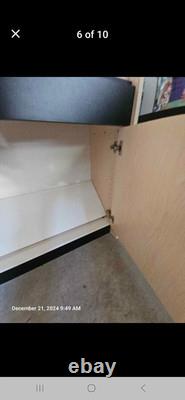 Large eyeglass display case with lights. 51 wide x 16 deep x 90 tall