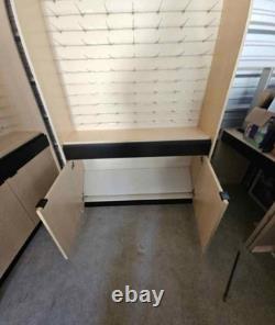 Large eyeglass display case with lights. 51 wide x 16 deep x 90 tall