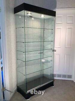 Used Glass Tower Display Showcase 15 shelf levels Store Fixture+Lights+Locking