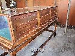 Vintage 1900 General Store Display Case on table stand 77inch long x 30inch wide