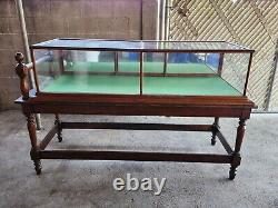Vintage 1900 General Store Display Case on table stand 77inch long x 30inch wide